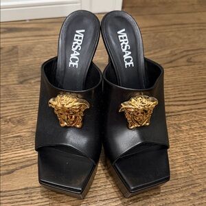 Versace Black Leather Mules with Gold Medusa Accent